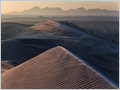 Sunrise on sand dunes near the village of Farahzad, Dasht-e Kavir desert, Iran.
